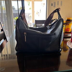 The Sak- Los Feliz Hobo Bag Navy in color with brown strap